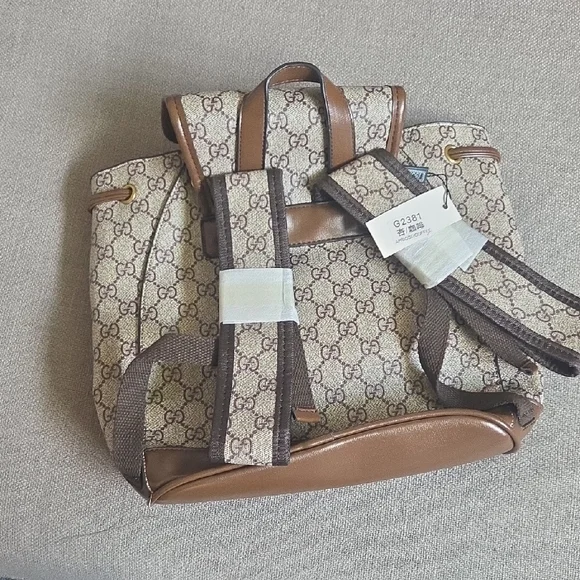 Cream and Brown Backpack with Signature Monogram13lx10d - Picture 2 of 8